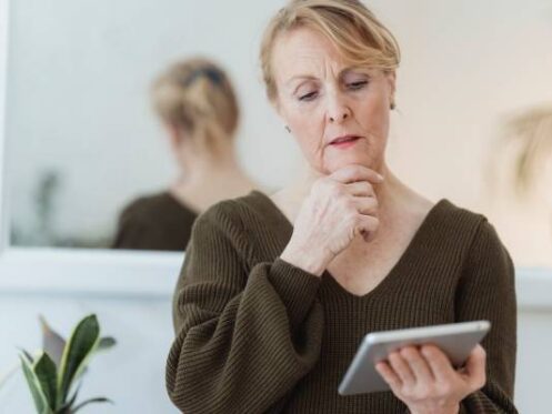 woman searching for plumbers online